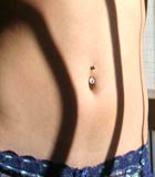 Tabatha Fey belly button ring
