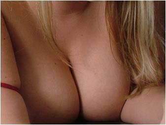 In bed With Faith sexy cleavage